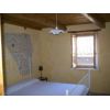 Casa di fila di 135 mq c.a. Piano terra: soggiorno con camino, cucina, due camere e bagno. Piano seminterrato: cantina, ripostiglio, bagno e altri due camere. Piano mansardato: locale unico con lucernario con vista collina e mare. C.e. GPorzione di casa/Indipendente