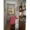 Casa indipendente di 95 mq c.a con scoperto di propriet, cantinetta, ripostiglio e garage per un totale di 35 mq c.a . Sottotetto abitabile , di pari metratura dell'abitazione. La soluzione potrebbe essere abitabile, ma  opportuno una ristrutturazione. Utilizzando le detrazioni fiscali potete personalizzare e realizzare i vostri desideri. Possibilit di comprare altro scoperto con magazzino.Porzione di casa/Indipendente